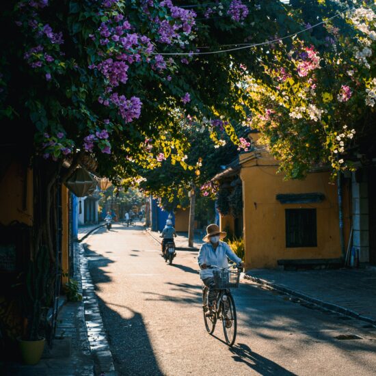 A sun-lit street of Hoi An Town in Vietnam.