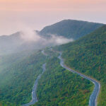 The Hai Van Pass in Vietnam, a must-see experience part of every classic North to South Vietnam holiday.