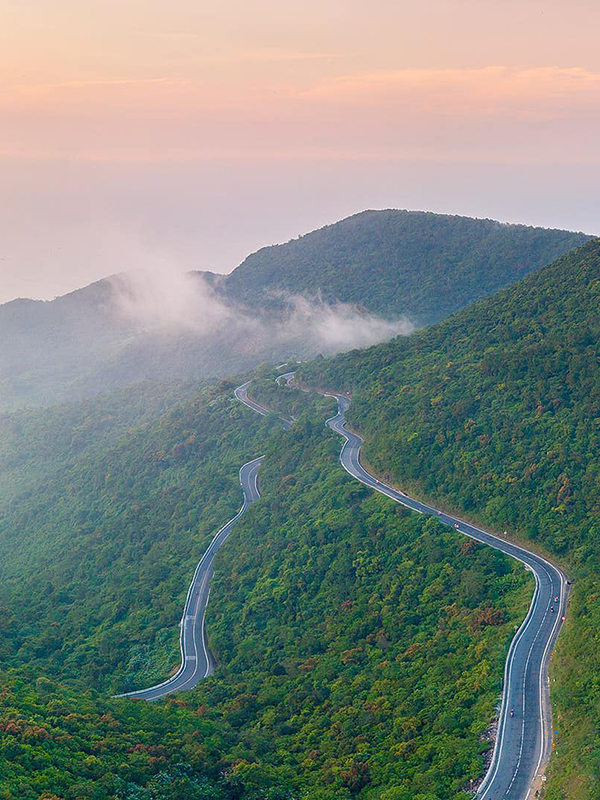 The Hai Van Pass in Vietnam, a must-see experience part of every classic North to South Vietnam holiday.