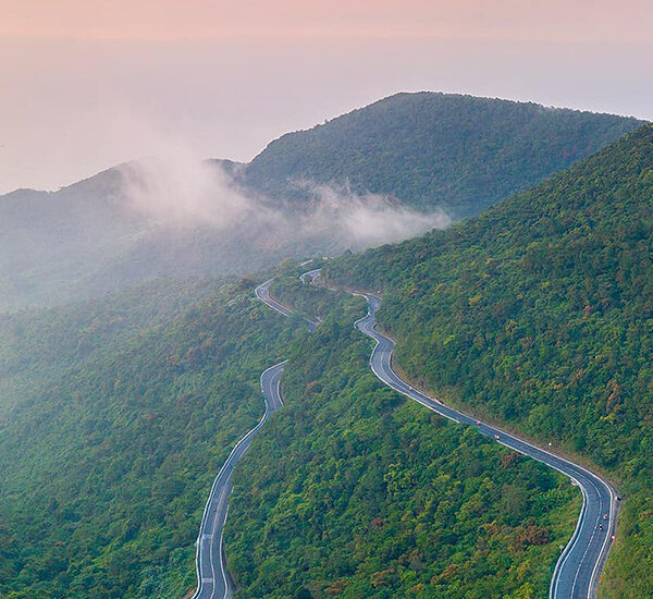 The Hai Van Pass in Vietnam, a must-see experience part of every classic North to South Vietnam holiday.